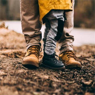 A child and an adult's feet