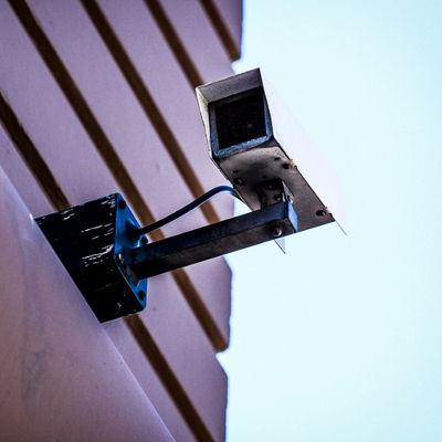 A security camera on a building.